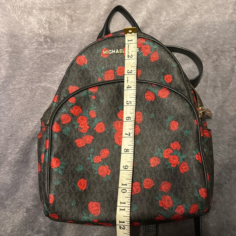 Michael Kors Abbey Logo Signature Rose Print Backpack. Red/black/floral.